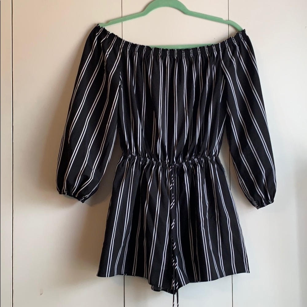 Off the shoulder black and white striped romper